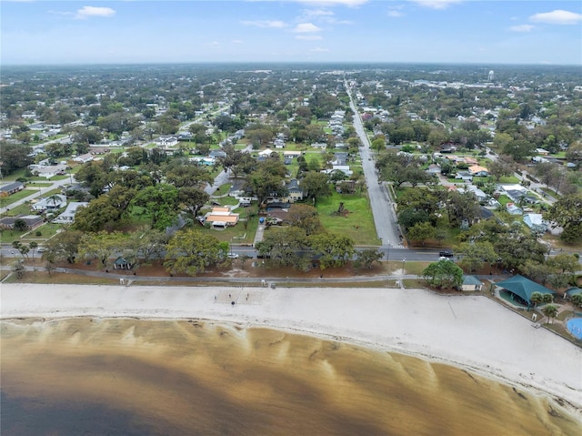 drone / aerial view with a water view and a view of the beach