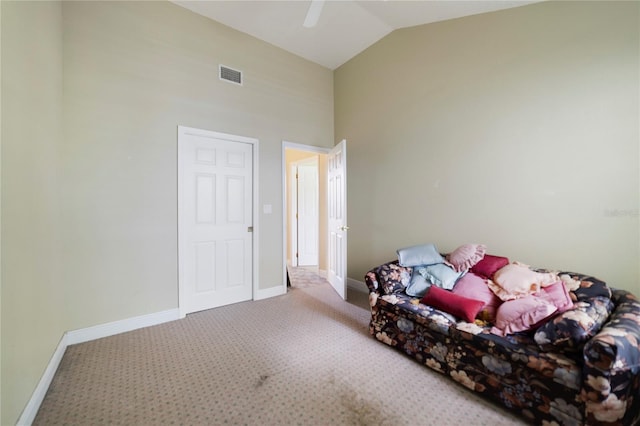 carpeted bedroom featuring high vaulted ceiling, a ceiling fan, visible vents, and baseboards