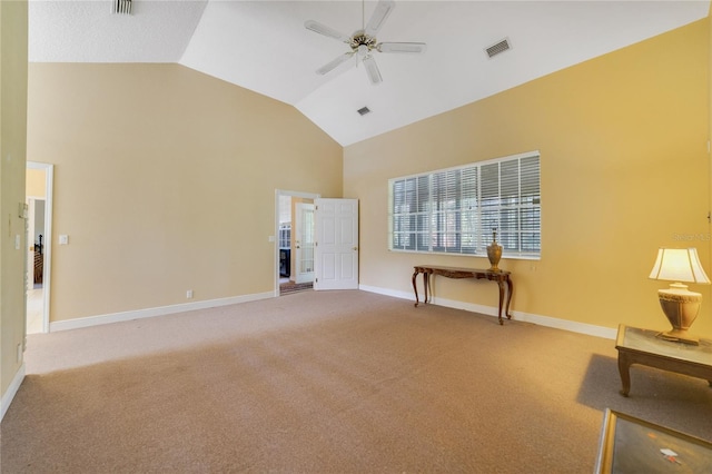 interior space with ceiling fan, high vaulted ceiling, visible vents, and baseboards