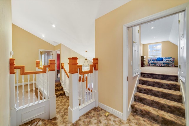 staircase with carpet, baseboards, vaulted ceiling, and recessed lighting