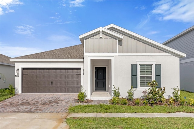 view of front of property with a garage