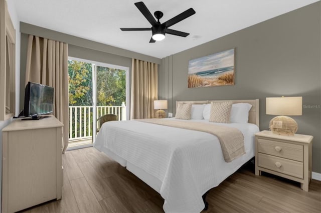 bedroom with ceiling fan, access to exterior, and wood-type flooring