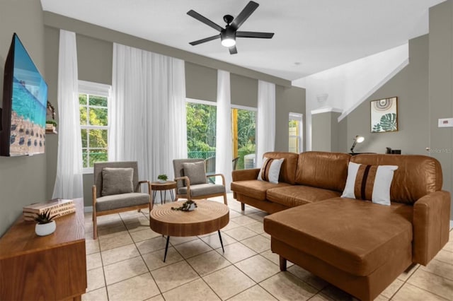 tiled living room with ceiling fan