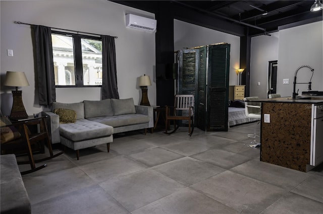 interior space featuring light tile patterned flooring, sink, a wall mounted air conditioner, and a towering ceiling