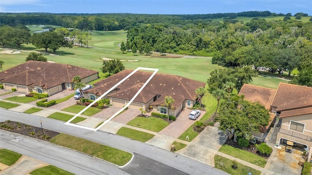 birds eye view of property featuring view of golf course