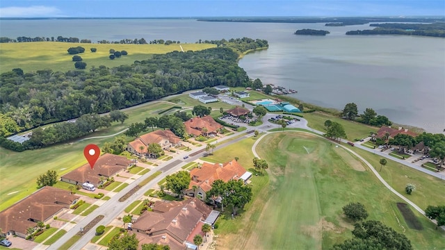 bird's eye view featuring a water view and a residential view