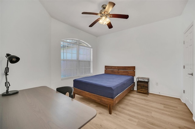 bedroom featuring light hardwood / wood-style flooring and ceiling fan