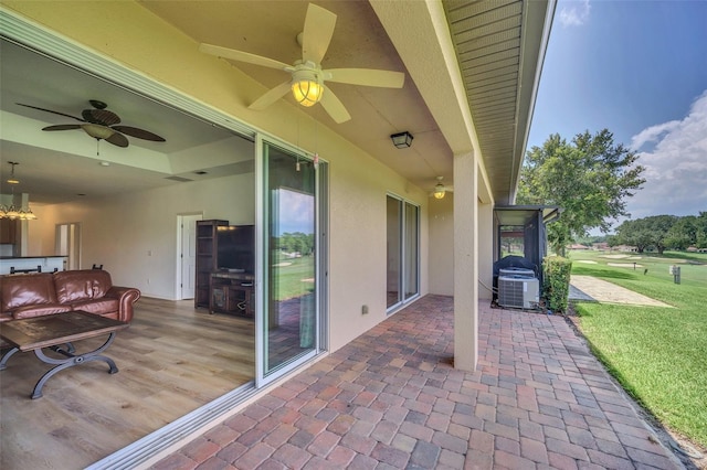 view of patio / terrace with outdoor lounge area, a ceiling fan, and central air condition unit