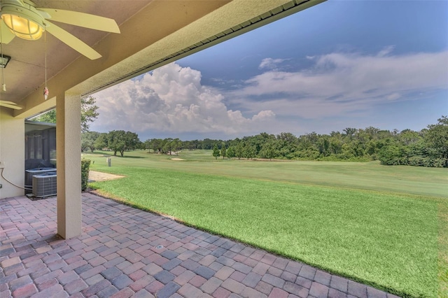 view of patio featuring ceiling fan and central air condition unit