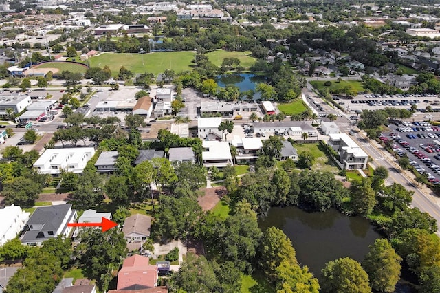 birds eye view of property with a water view