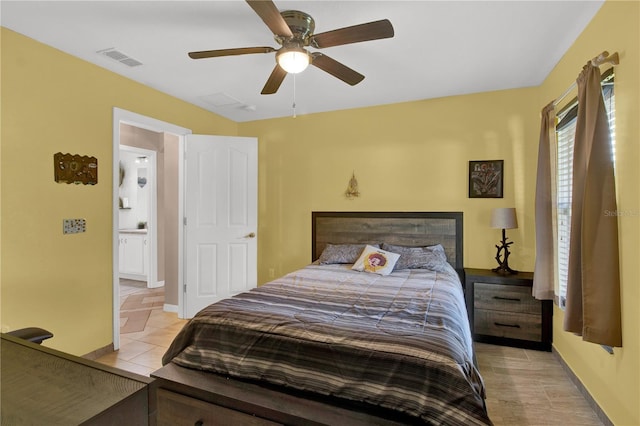 bedroom featuring ceiling fan and light tile patterned flooring