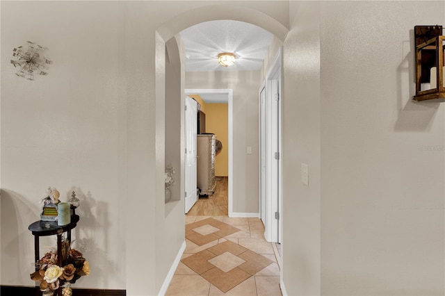 hall with light hardwood / wood-style floors