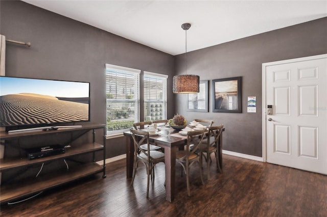 dining space featuring dark hardwood / wood-style floors