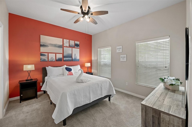 bedroom featuring ceiling fan and carpet flooring