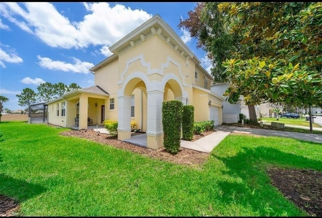 exterior space with a garage and a front yard