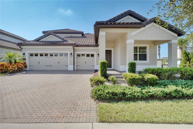 view of front of property with a garage