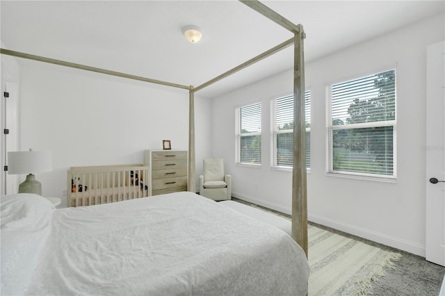 bedroom with light wood-type flooring