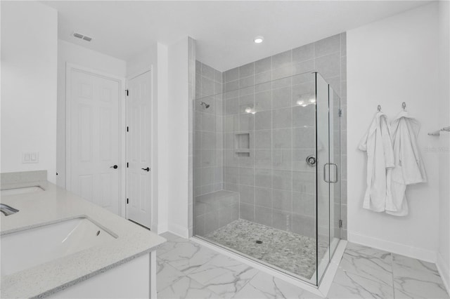 bathroom featuring vanity and walk in shower