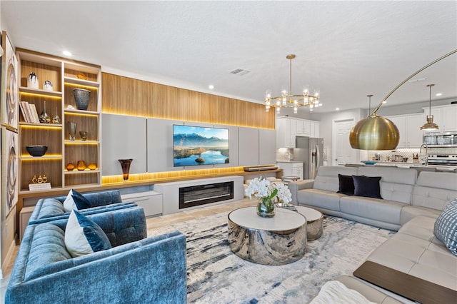 living room with a chandelier