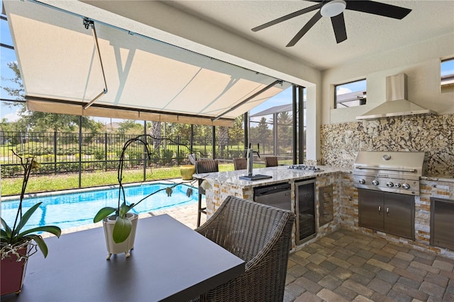 view of patio featuring ceiling fan, a fenced in pool, area for grilling, and grilling area