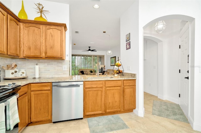 kitchen featuring sink, tasteful backsplash, ceiling fan, dishwasher, and light tile patterned floors