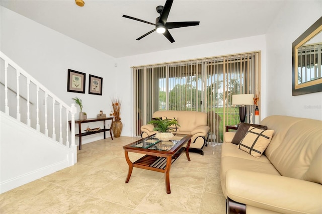 living room with ceiling fan and light tile patterned floors