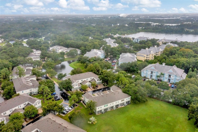 drone / aerial view with a water view