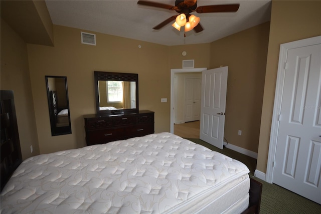 carpeted bedroom with ceiling fan