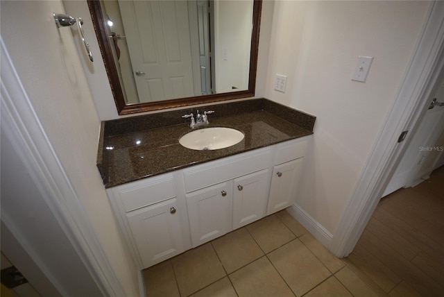 bathroom featuring vanity and tile patterned floors