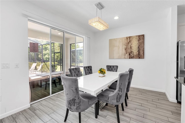 dining room featuring light hardwood / wood-style floors