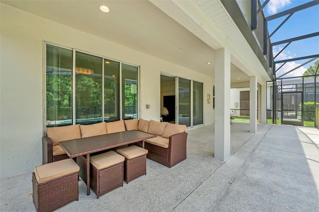 view of patio / terrace with glass enclosure and outdoor lounge area