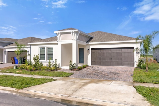 view of front of home with a garage