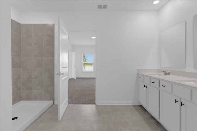 bathroom featuring vanity and tile patterned flooring