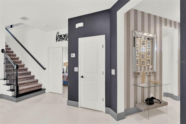 entryway featuring concrete floors