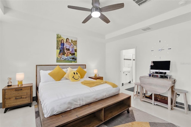 bedroom with ensuite bath and ceiling fan