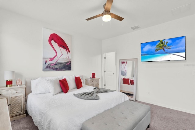 carpeted bedroom with ceiling fan