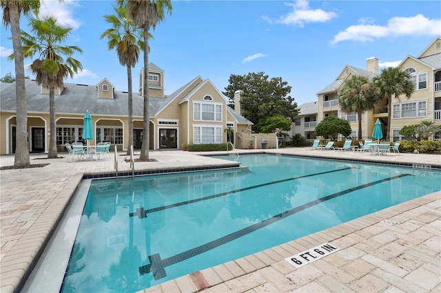 view of pool featuring a patio