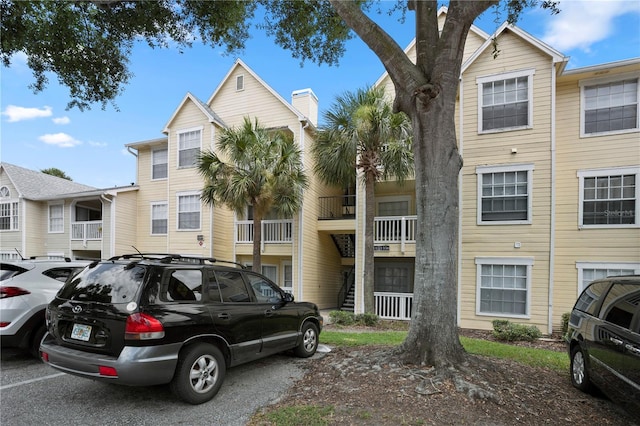 view of front of property with a balcony