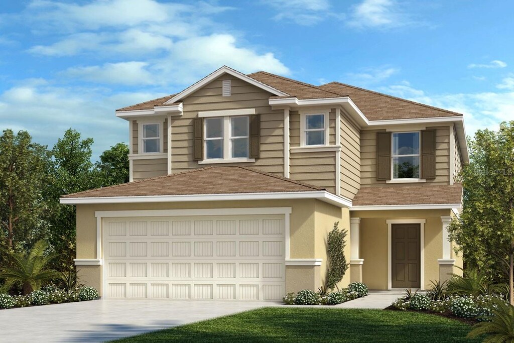 2178 Nass Rd, Zephyrhills, FL 33540 - view of front of home with a garage