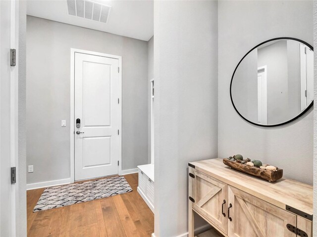 foyer entrance featuring light hardwood / wood-style flooring