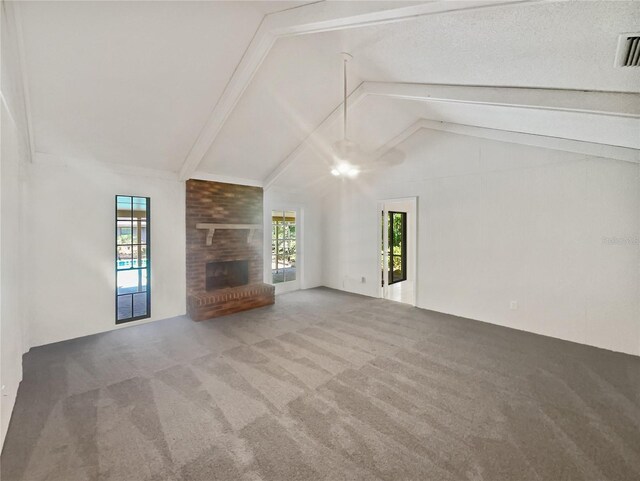 bonus room with brick wall, lofted ceiling, plenty of natural light, and a brick fireplace