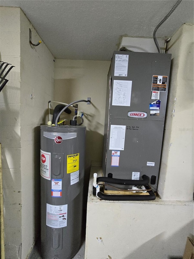 utility room with water heater and heating unit