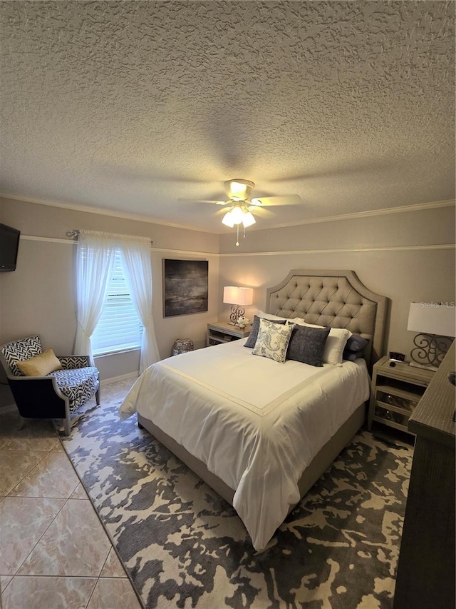 tiled bedroom with a textured ceiling and ceiling fan