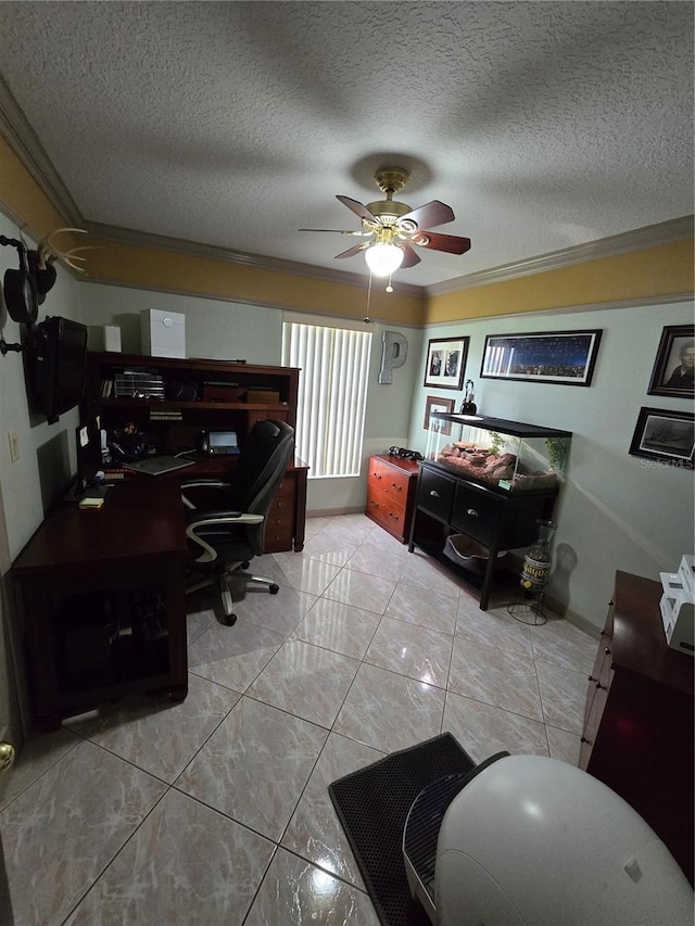 tiled office space featuring ceiling fan, ornamental molding, and a textured ceiling