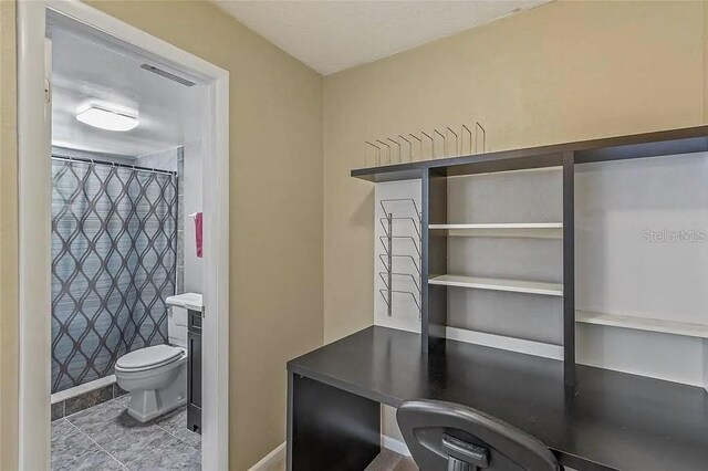 bathroom with vanity, toilet, and a shower with shower curtain