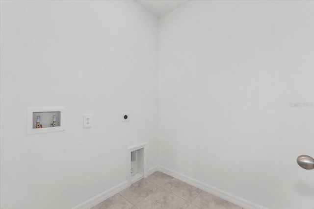 laundry room with electric dryer hookup, light tile patterned floors, baseboards, laundry area, and washer hookup