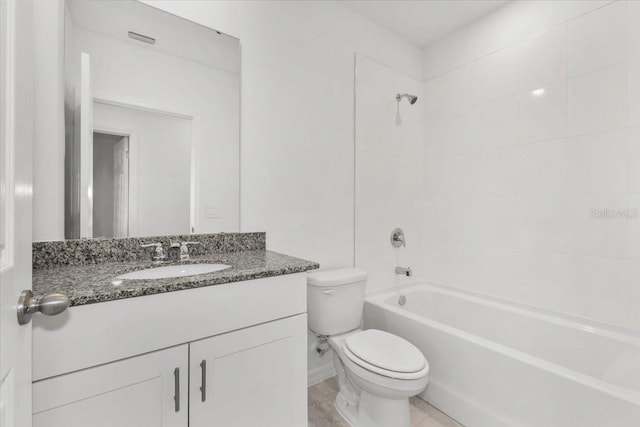 full bath with washtub / shower combination, toilet, and vanity