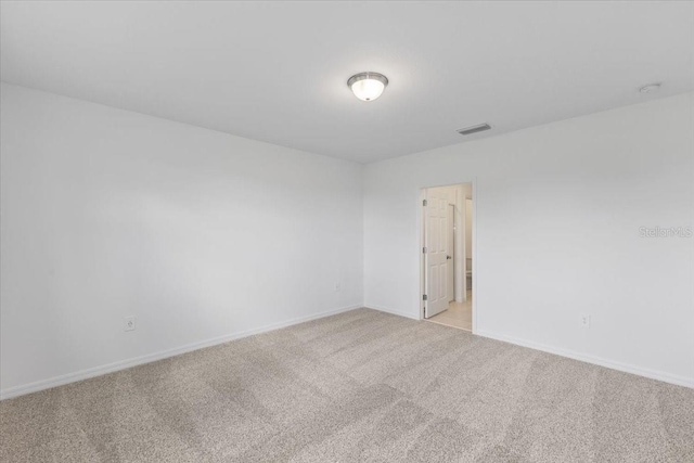 empty room with light carpet