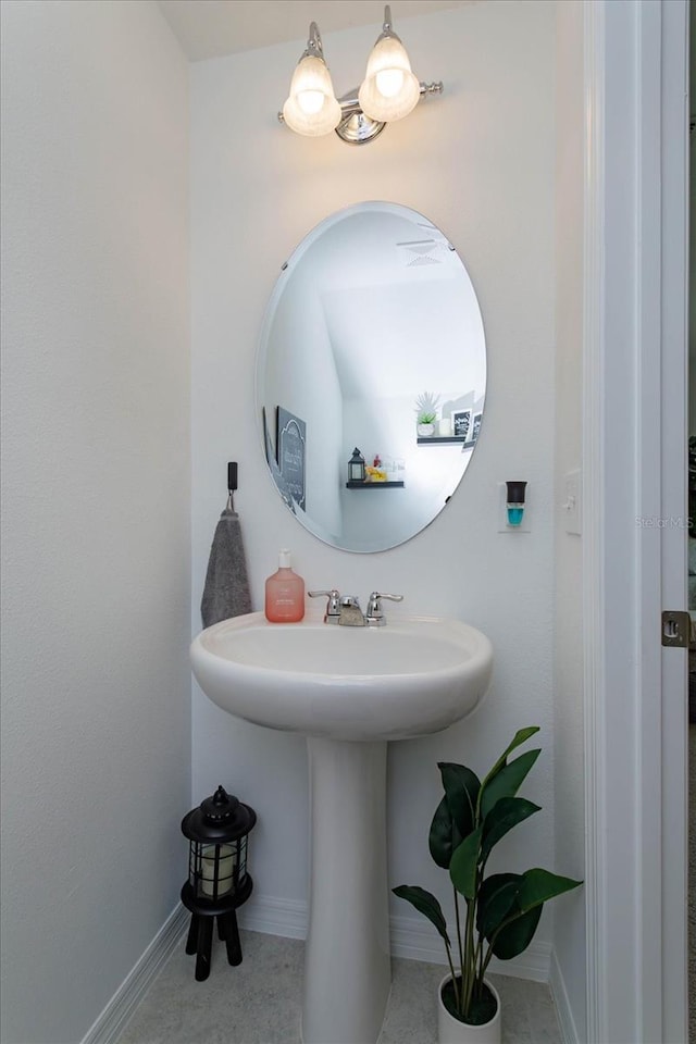 bathroom with tile patterned floors