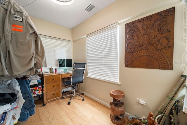 home office featuring light wood-type flooring